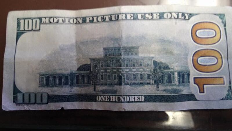 This counterfeit money, marked for motion picture use, has been passed around town. (Source:...
