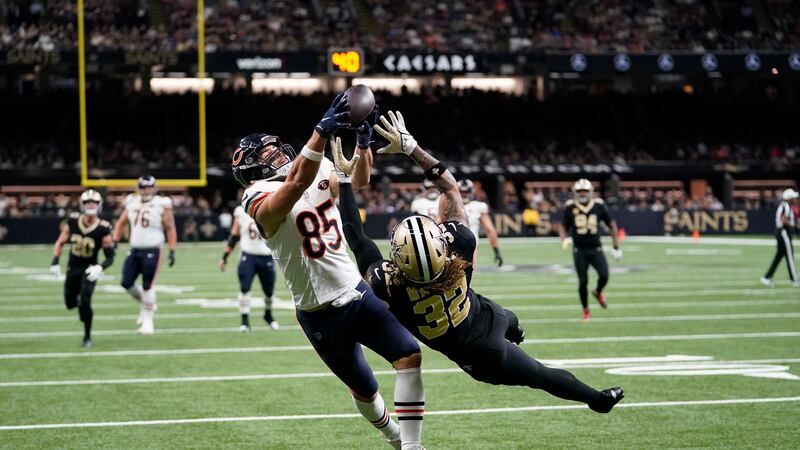 Chicago Bears tight end Cole Kmet (85) makes a touchdown catch over Saints safety Tyrann...
