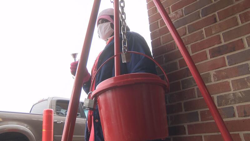 Shirley Ford rings a bell for the Salvation Army at the Corner Market at Midtown Thursday.