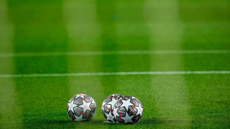Balls of the Champions League are pictured prior of the start of the Champions League round of...