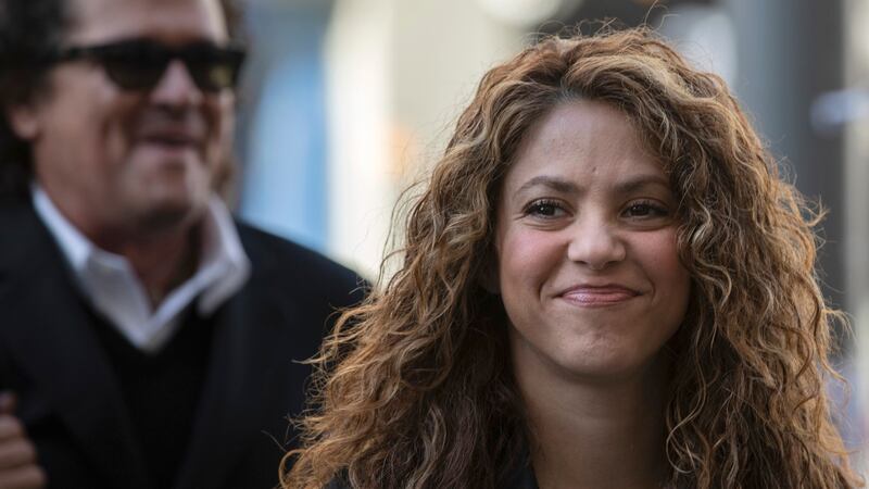 FILE - Colombian performer Shakira arrives at court in Madrid, Spain, March 27, 2019. Spanish...