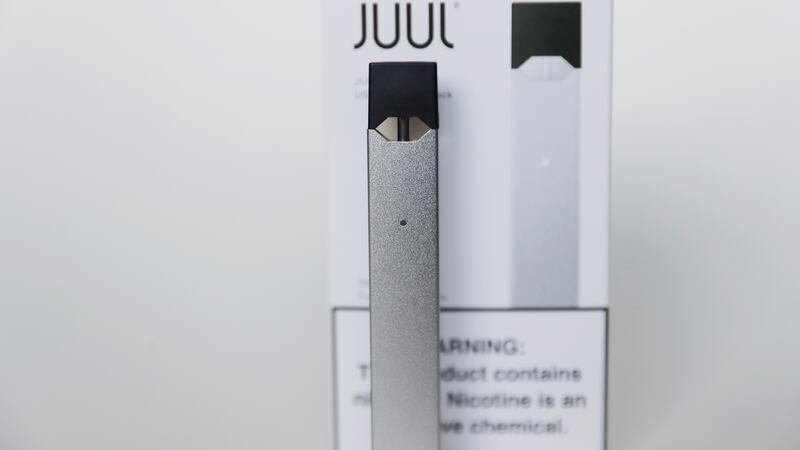 An electronic cigarette from Juul Labs is seen on Tuesday, Feb. 25, 2020, in Pembroke Pines,...