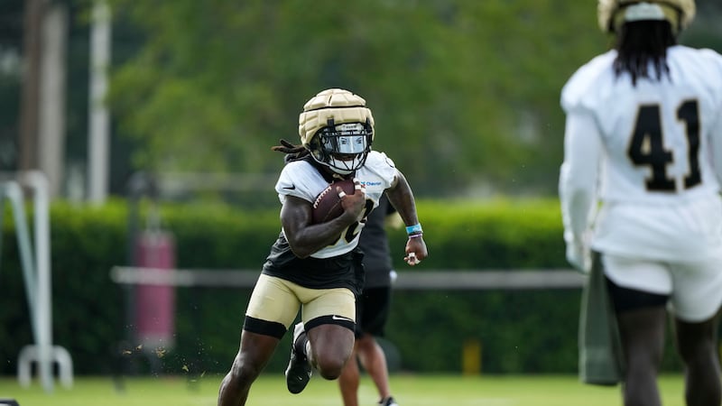 New Orleans Saints running back Jamaal Williams (30) runs through drills at training camp. (AP...
